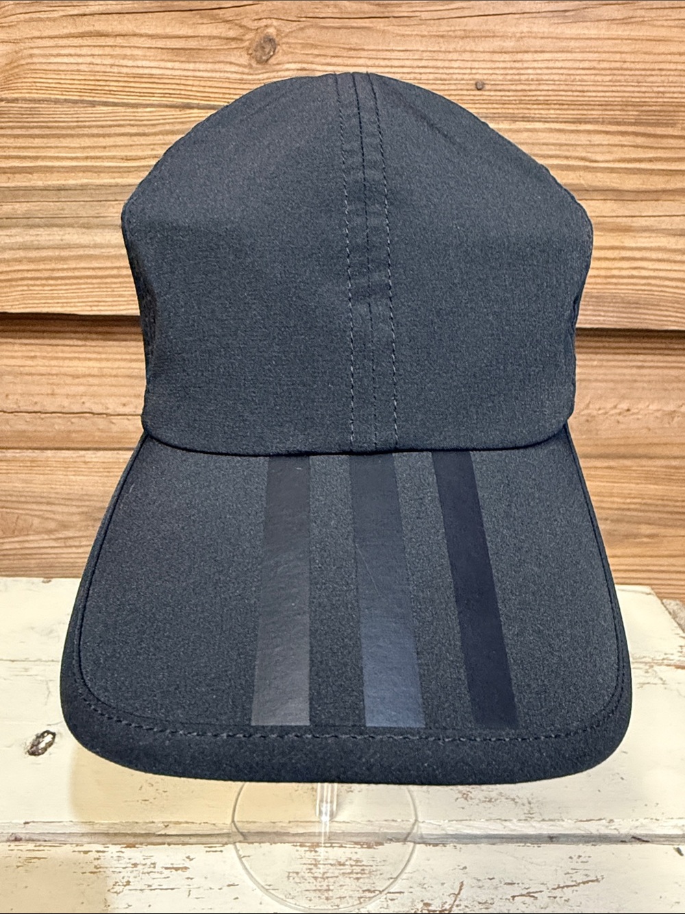 Black Athletic Cap with Subtle Stripe Detail